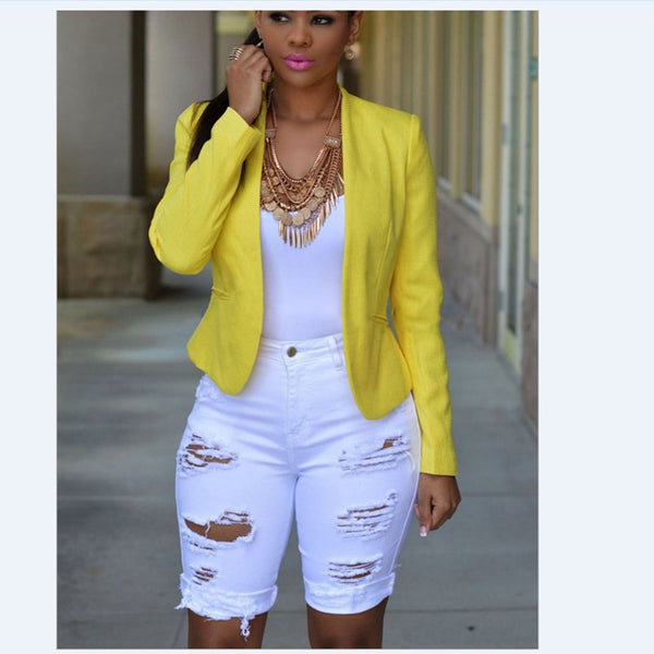 Short cortos de mezclilla elásticos lavados con agujeros rasgados