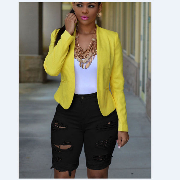 Short cortos de mezclilla elásticos lavados con agujeros rasgados