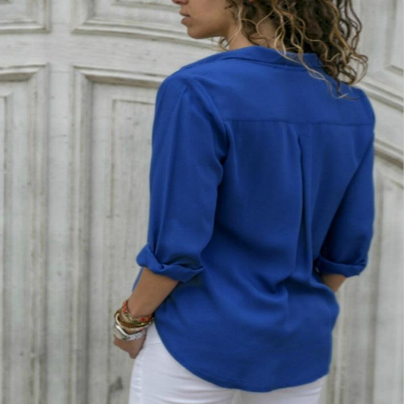 Blusa con cuello en V sólido de manga larga